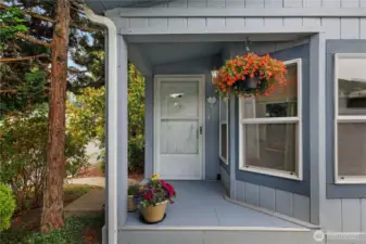 Covered porch to keep you dry at your front door.