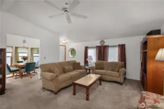 Roomy living room with vaulted ceilings.