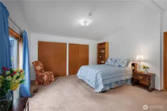 Over-sized primary bedroom with lots of closet space