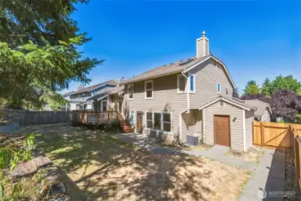 Great yard for pets or games! Note the detached Storage Shed