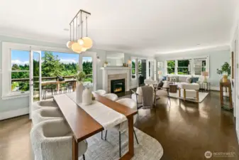 Living room spans the entire width of the house with 180 degree views of the Cascades, Arboretum and Lake Washington.