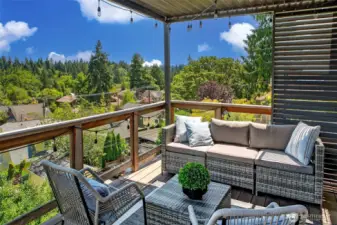 Excellent deck is huge and expansive to take in the views. This section is covered for all weather enjoyment.