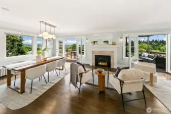 Living room spans the entire width of the house with 180 degree views of the Cascades, Arboretum and Lake Washington.