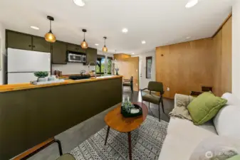 Lowest level living room; this space has been used as a rental unit in the past.