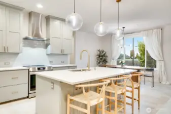 Extra large island with seating. Cooking, hosting and enjoying time together just got a little more fun.