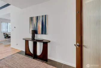 Entry hallway with coat closet to the left.