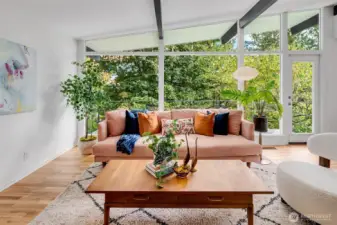 Living room with full wall of windows.