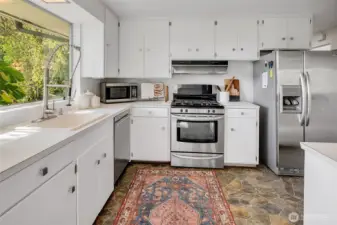 Great kitchen with storage and counter space.