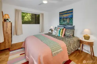 Corner room sees trees from both windows.
