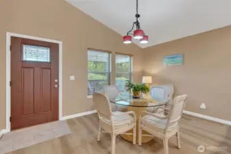 Roomy dining room. Door leads to the covered deck and backyard