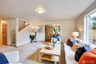 Spacious living room with ample natural light.