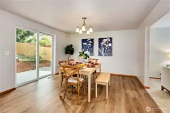 Sliding doors out to private back patio and well-established yard.