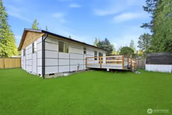 Large fenced backyard with room for RV parking.