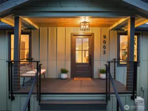 Enjoy your morning beverage on the cozy front porch...a beloved feature prior to and after the remodel.