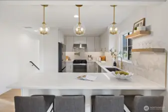 Gather around the generous sized peninsula with eating bar ideal for every day meals and connection