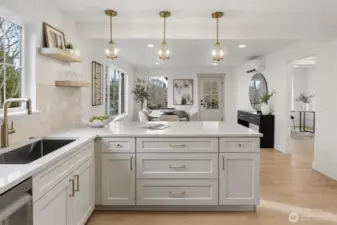 Stylish fixtures throughout tie the contemporary coastal theme together