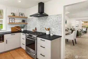 Recent Kitchen Remodel. Honed Quartz Counters, Custom Floating Shelves, Mosaic Backsplash
