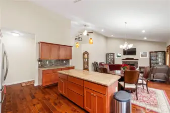 The large kitchen island seems to be a favorite gathering spot.