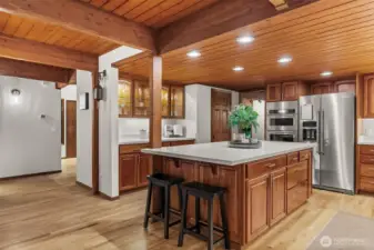 Modern luxury meets timeless craftsmanship. The sleek new hardware adds a crisp, contemporary touch to the stunning cabinetry and natural wood finishes.