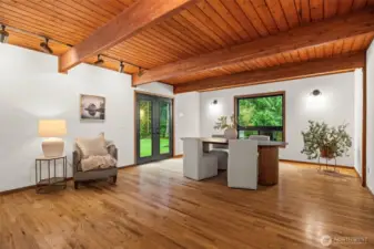 A dining space that truly breathes. With the living area connected and direct outside access, this wing of the home is designed for a lifestyle without boundaries.