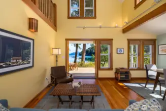 Soaring ceilings and lots of windows bring in the sunshine and stunning ocean and pastoral views