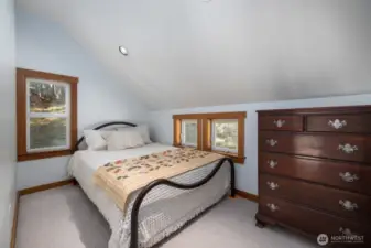 Second bedroom on upper loft floor.