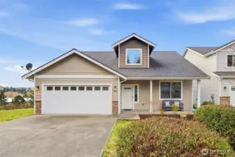 Giving off Craftsman vibes, this home has a welcoming front porch and accessible entry with no-step garage and front door entry. Master is on the main.