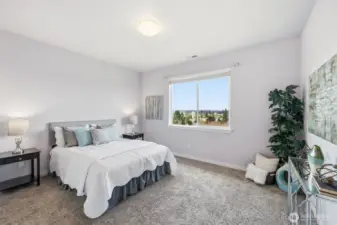 The master on main - a private sanctuary featuring a 5-piece bathroom, double vanity, toilet, shower and large soaking tub with a view toward the dedicated greenbelt to the south. A large walk-in closet also connects the dots.