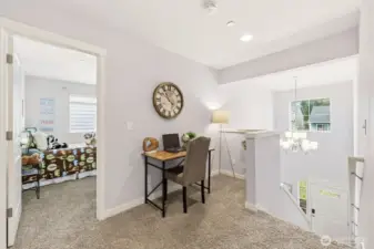 An open landing on the upper floor provides flexibility.