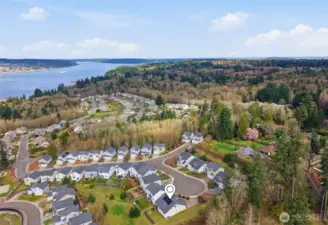 Cul-de-sac setting, surrounded by open space to the west and south. End of bluff.