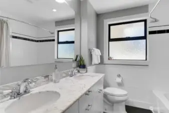 Hall bath. Remodeled and double sinks.