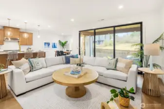 The great room is perfect for bringing the outdoors, inside with multi-slide door that opens to an oversized covered patio with gas fireplace.