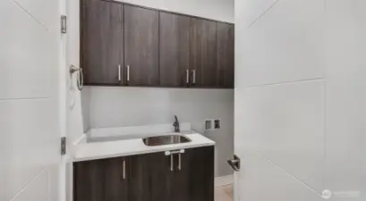 Mud room off garage with 2nd laundry available.