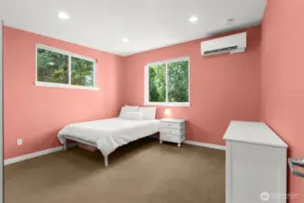 Second bedroom on the upper level is huge!