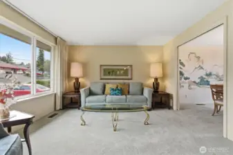 The plush carpet with a cushioned pad offers extra comfort underfoot.