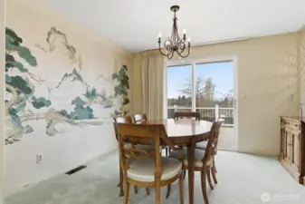 Dining room opens to a brand-new deck for easy indoor-outdoor living