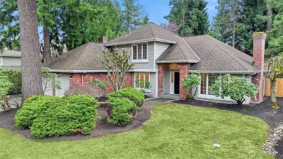 Welcome to this William Buchan classic home in coveted Hampton Woods