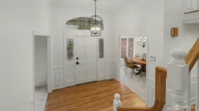 Beautiful windows flank the entryway adding elegance and light.