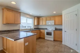 Kitchen with granite and nice size breakfast bar