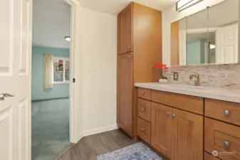 Master bedroom suite with dual closets and a remodeled bathroom.