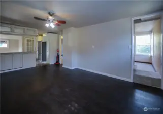Spacious Living room adjacent to kitchen, makes for excellent entertaining!