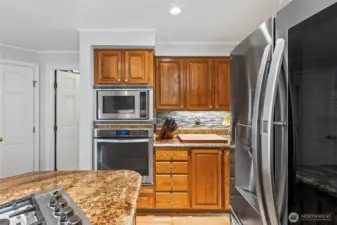 Dimmable undermount lighting is throughout the kitchen cabinetry.