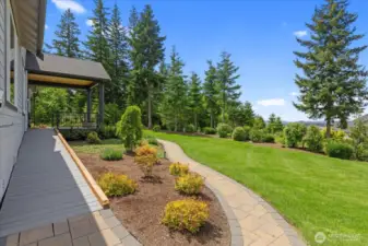 Professionally installed ramp and pathways all around the home.  The landscaping and views are stunning!!
