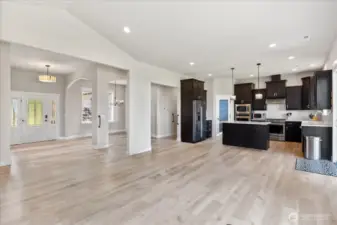 Beautiful open concept of the main living area.  Home features 10' ceilings.  (Furniture has been digitally removed.)