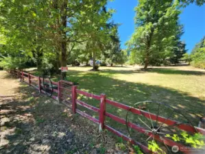 Old wooden fence boarders the property.