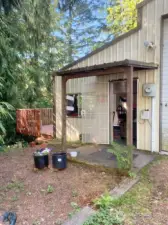 One bedroom/One Bath Apartment, deck, fenced yard, attached to shop - 2 car garage with lots of storage!