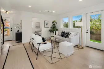 Access to the private back yard and patio through this door.  These windows face south.