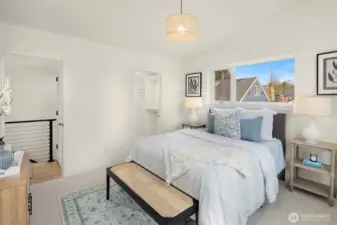 Primary bedroom and the view to the large walk in closet.