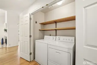 Easy-access laundry closet. Side-by-side full-size washer and dryer