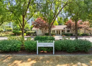 Community library with quiet reading space, also offers club meeting rooms for gatherings, classes, and events